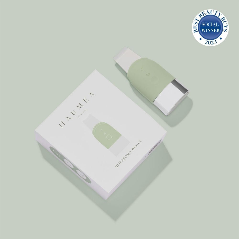 Haumea Ultrasono Device ultrasonic facial cleansing and skin lifting tool. Award winning bagde.